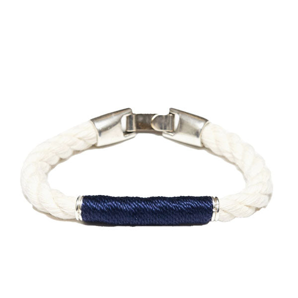 Allison Cole Beacon bracelet made with white rope accented by navy rope and brushed silver clasps