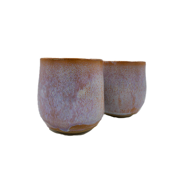 Side photo of side-by-side pair of stoneware wine mugs with opal glaze handmade by Allison Morrissey