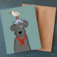 Sailor Dog boxed greeting card set featuring a gray dog wearing a sailor scarf with a seagull perched on its captain's hat.