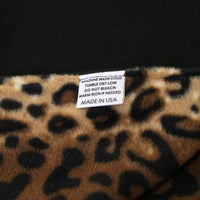 Made in America Denim Blanket Company black denim blanket with leopard print fleece lining