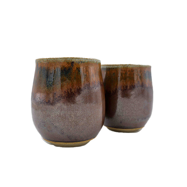 Side photo of side-by-side pair of stoneware wine mugs with brown glaze handmade by Allison Morrissey