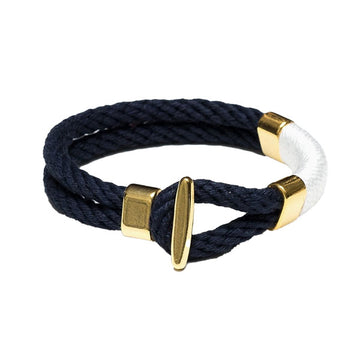 Allison Cole Cambridge bracelet made with navy double rope accented with white rope and brass clasps