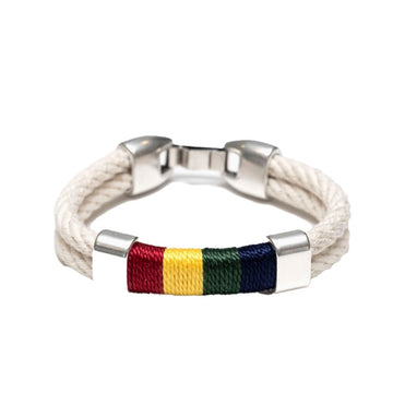 Allison Cole Hancock bracelet made with white double rope accented with red, yellow, green, and blue rope with brushed silver clasps