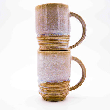 Rustic stacked pair of stoneware mugs with opal glaze handmade by Allison Morrissey