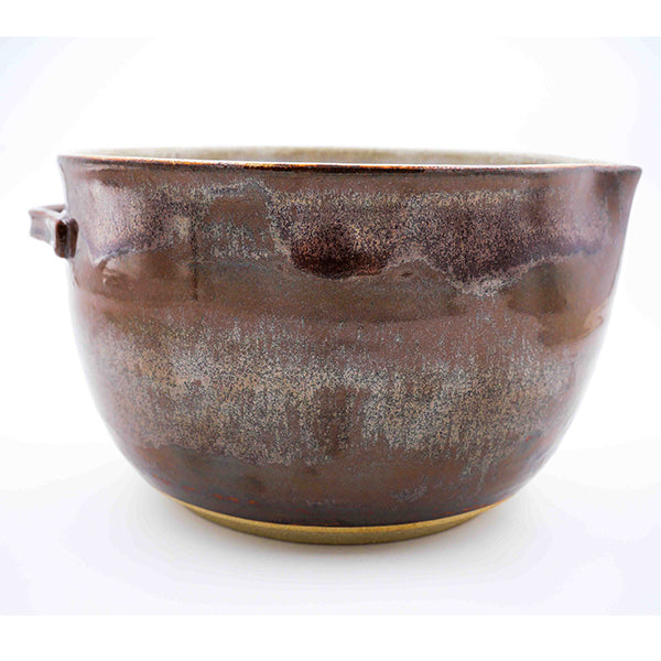 Side photo of stoneware mixing bowl with brown exterior glaze handmade by Allison Morrissey