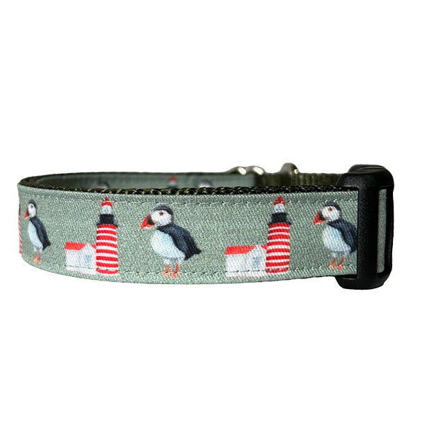 Sew Fetch Dog Co. gray dog collar with puffins and red and white lighthouses and black plastic closure