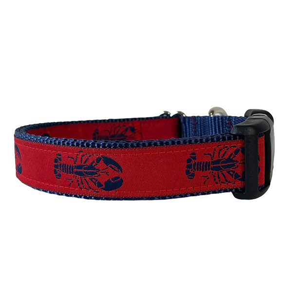 Sew Fetch Dog Co. red dog collar with navy blue lobsters and black plastic closure