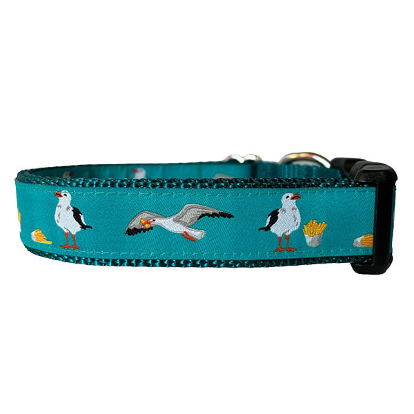 Sew Fetch Dog Co. teal dog collar with seagulls and french-fries and black plastic closure