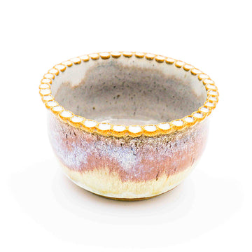 Small stoneware bowl with pink and cream glaze handmade by Allison Morrissey