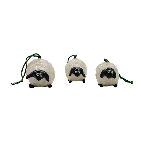 Three small stoneware sheep ornaments with black glazed faces and white glazed bodies handmade by Allison Morrissey