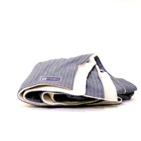 Side view Denim Blanket Company herringbone denim blanket with cream fleece lining