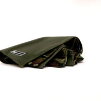 Side view Denim Blanket Company army green blanket with cameo fleece lining